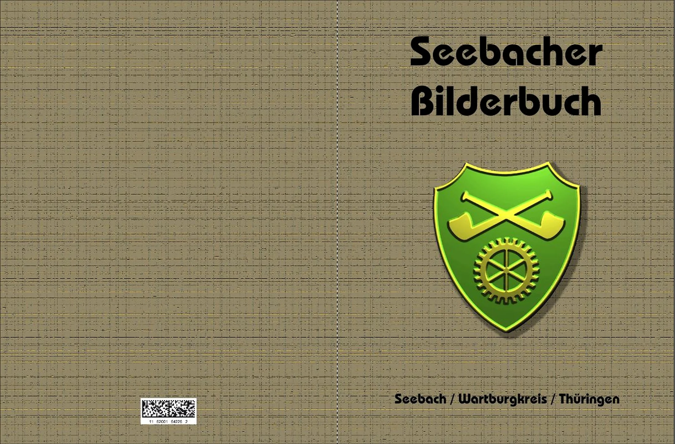 Umschlag des Seebacher Bilderbuchs mit Gemeindewappen auf beigefarbenem Leinenhintergrund
