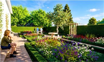 Gepflegter Staudengarten mit Sitzstufen und Wasserbecken
